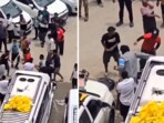 The footage, now viral on social media, captures men attacking each other with wooden sticks. The footage, now viral on social media, captures men attacking each other with wooden sticks.