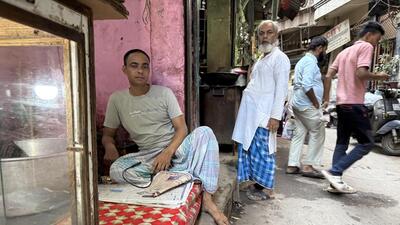 A man in check lungi and T-shirt is sitting silently in the bakery. (HT Photo) A man in check lungi and T-shirt is sitting silently in the bakery. (HT Photo)
