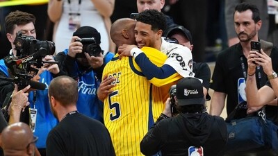 Former Indiana Pacers player Reggie Miller congratulates Tyrese Haliburton #0 of the Indiana Pacers after their 108-91 win against the Oklahoma City Thunder Game Six of the 2025 NBA Finals at Gainbridge Fieldhouse on June 19, 2025 in Indianapolis, Indiana. (Getty Images via AFP) Former Indiana Pacers player Reggie Miller congratulates Tyrese Haliburton #0 of the Indiana Pacers after their 108-91 win against the Oklahoma City Thunder Game Six of the 2025 NBA Finals at Gainbridge Fieldhouse on June 19, 2025 in Indianapolis, Indiana. (Getty Images via AFP)