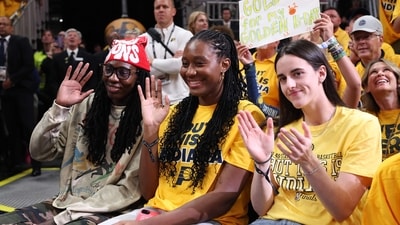 (L to R) Natasha Howard, Aliyah Boston, and Caitlin Clark of the Indiana Fever look on during the second quarter in Game Three of the 2025 NBA Finals between the Indiana Pacers and the Oklahoma City Thunder at Gainbridge Fieldhouse on June 11, 2025 in Indianapolis, Indiana. (Getty Images via AFP) (L to R) Natasha Howard, Aliyah Boston, and Caitlin Clark of the Indiana Fever look on during the second quarter in Game Three of the 2025 NBA Finals between the Indiana Pacers and the Oklahoma City Thunder at Gainbridge Fieldhouse on June 11, 2025 in Indianapolis, Indiana. (Getty Images via AFP)