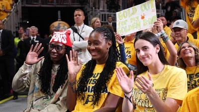 (L to R) Natasha Howard, Aliyah Boston, and Caitlin Clark of the Indiana Fever look on during the second quarter in Game Three of the 2025 NBA Finals between the Indiana Pacers and the Oklahoma City Thunder at Gainbridge Fieldhouse on June 11, 2025 in Indianapolis, Indiana. (Getty Images via AFP) (L to R) Natasha Howard, Aliyah Boston, and Caitlin Clark of the Indiana Fever look on during the second quarter in Game Three of the 2025 NBA Finals between the Indiana Pacers and the Oklahoma City Thunder at Gainbridge Fieldhouse on June 11, 2025 in Indianapolis, Indiana. (Getty Images via AFP)