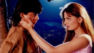 Deepshikha Nagpal's still with Shah Rukh Khan from Koyla.