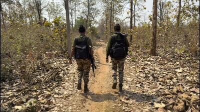 District Reserve Guard personnel patrol in Bastar division of Chhattisgarh. (AFP) District Reserve Guard personnel patrol in Bastar division of Chhattisgarh. (AFP)