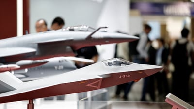 Models of military jets, including the J-35A stealth fighter, are displayed at the Avic Chengdu Aircraft pavilion, during the 55th International Paris Airshow at Le Bourget Airport near Paris, France, June 18, 2025. (Reuters)
