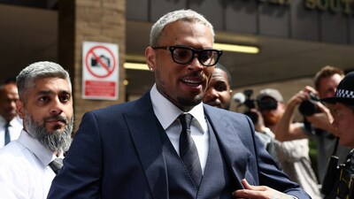 U.S. singer Chris Brown, who has been charged with inflicting grievous bodily harm in what prosecutors said was an "unprovoked attack" on a music producer at the Tape nightclub in central London in 2023, walks outside Southwark Crown Court in London, Britain, June 20, 2025. REUTERS/Isabel Infantes (REUTERS)