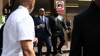 U.S. singer Chris Brown, who has been charged with inflicting grievous bodily harm in what prosecutors said was an "unprovoked attack" on a music producer at the Tape nightclub in central London in 2023, walks outside Southwark Crown Court in London, Britain, June 20, 2025. REUTERS/Isabel Infantes (REUTERS)