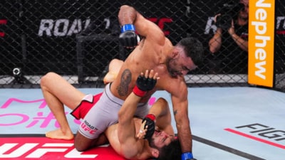 Mansher Khera in action against Aziz Khaydarov during their Road to UFC bout in May. (UFC) Mansher Khera in action against Aziz Khaydarov during their Road to UFC bout in May. (UFC)