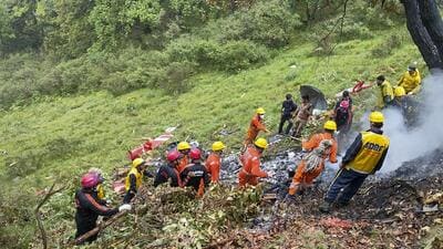 NDRF and SDRF personnel at the spot after a helicopter crashed near the Kedarnath shrine, in Rudraprayag district of Uttarakhand on June 15. Seven people were killed in the incident. (NDRF/PTI) NDRF and SDRF personnel at the spot after a helicopter crashed near the Kedarnath shrine, in Rudraprayag district of Uttarakhand on June 15. Seven people were killed in the incident. (NDRF/PTI)