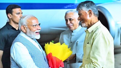Prime Minister Narendra Modi receives a warm welcome from Andhra Pradesh Governor Syed Abdul Nazeer and state Chief Minister N. Chandrababu Naidu on his arrival, in Visakhapatnam on Friday. (X/ncbn) Prime Minister Narendra Modi receives a warm welcome from Andhra Pradesh Governor Syed Abdul Nazeer and state Chief Minister N. Chandrababu Naidu on his arrival, in Visakhapatnam on Friday. (X/ncbn)