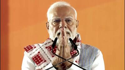Prime Minister Narendra Modi greets the gathering during a public meeting in Bhubaneswar on Friday. (DD/ANI) Prime Minister Narendra Modi greets the gathering during a public meeting in Bhubaneswar on Friday. (DD/ANI)