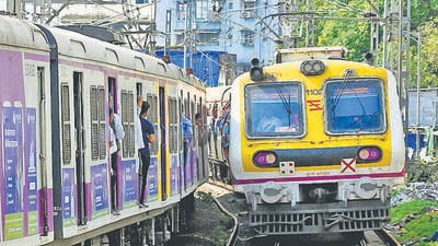 Thane, India. June 10, 2025: Local trains cross near section at Mumbra Railway Station, where four commuters lost their lives and nine others were injured on June 9, 2025, in Thane, India. The incident occurred when the commuters fell from a train heading to Chhatrapati Shivaji Maharaj Terminus. Thane India. June 10, 2025. (Photo by Raju Shinde/HT Photo) (Hindustan Times) Thane, India. June 10, 2025: Local trains cross near section at Mumbra Railway Station, where four commuters lost their lives and nine others were injured on June 9, 2025, in Thane, India. The incident occurred when the commuters fell from a train heading to Chhatrapati Shivaji Maharaj Terminus. Thane India. June 10, 2025. (Photo by Raju Shinde/HT Photo) (Hindustan Times)