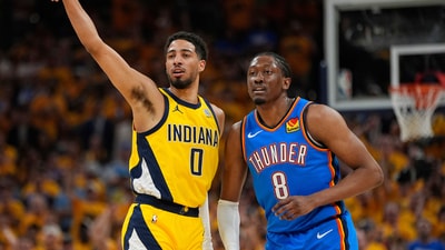 Indiana Pacers guard Tyrese Haliburton (0) motions next to Oklahoma City Thunder forward Jalen Williams (8) (AP) Indiana Pacers guard Tyrese Haliburton (0) motions next to Oklahoma City Thunder forward Jalen Williams (8) (AP)