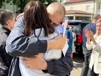 Exiled Belarusian opposition leader Svetlana Tikhanovskaya hugs her husband Sergei Tikhanovsky in unnamed place in Lithuania. Exiled Belarusian opposition leader Svetlana Tikhanovskaya hugs her husband Sergei Tikhanovsky in unnamed place in Lithuania.
