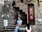 Street art in Chongqing. ‘There is growing uncertainty, particularly among the urban middle-class,’ says journalist, author and UK MP Yang. ‘An idea that, even with greater effort, the returns will be lower.’ (Getty Images) Street art in Chongqing. ‘There is growing uncertainty, particularly among the urban middle-class,’ says journalist, author and UK MP Yang. ‘An idea that, even with greater effort, the returns will be lower.’ (Getty Images)