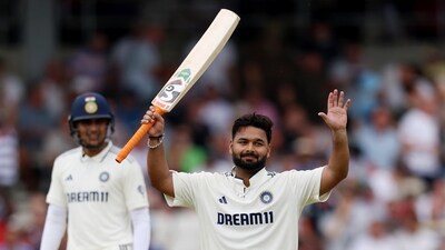 Rishabh Pant celebrates his century, his seventh in his Test career, making him India's most prolific wicketkeeper by breaking MS Dhoni's record. How else to do it except with a one-handed six over cow corner. (@BCCI X) Rishabh Pant celebrates his century, his seventh in his Test career, making him India's most prolific wicketkeeper by breaking MS Dhoni's record. How else to do it except with a one-handed six over cow corner. (@BCCI X)