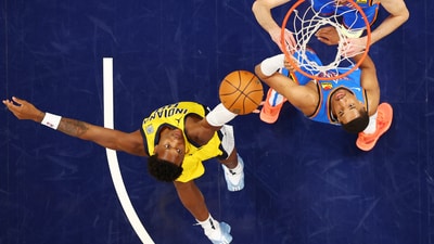 Indiana Pacers guard Bennedict Mathurin (00) reaches for the ball against the Oklahoma City Thunder during game six of the 2025 NBA Finals at Gainbridge Fieldhouse. Mandatory Credit: Maddie Meyer-Pool Photo via Imagn Images (IMAGN IMAGES via Reuters Connect)