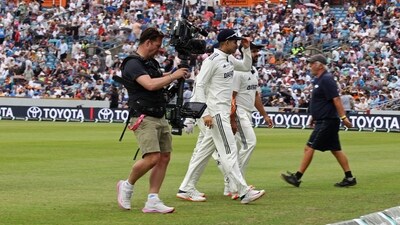 India's fielders leave the field as rain stops play on day two of the first cricket test match between England and India at Headingley cricket ground in Leeds (AFP) India's fielders leave the field as rain stops play on day two of the first cricket test match between England and India at Headingley cricket ground in Leeds (AFP)