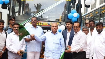Karnataka transport minister launching BMTC express service in Bengaluru.