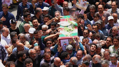 Earlier a prayer ceremony was conducted for Amin Karami, a member of Iranian Revolutionary Guard, who was killed during Israeli strikes. (AP) Earlier a prayer ceremony was conducted for Amin Karami, a member of Iranian Revolutionary Guard, who was killed during Israeli strikes. (AP)