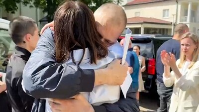 Exiled Belarusian opposition leader Svetlana Tikhanovskaya hugs her husband Sergei Tikhanovsky in unnamed place in Lithuania. (AFP) Exiled Belarusian opposition leader Svetlana Tikhanovskaya hugs her husband Sergei Tikhanovsky in unnamed place in Lithuania. (AFP)