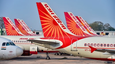 Air India planes are parked at the Indira Gandhi International Airport in New Delhi. (PTI file) Air India planes are parked at the Indira Gandhi International Airport in New Delhi. (PTI file)