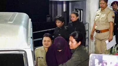 Police escort Sonam Raghuvanshi, accused in the alleged murder of her husband Raja Raghuvanshi during their honeymoon in Meghalaya, after her medical check-up at Ganesh Das Hospital, in Shillong, Wednesday. (PTI) Police escort Sonam Raghuvanshi, accused in the alleged murder of her husband Raja Raghuvanshi during their honeymoon in Meghalaya, after her medical check-up at Ganesh Das Hospital, in Shillong, Wednesday. (PTI)