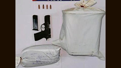 Police have recovered 6.15kg heroin, one PX5 pistol (30 bore), four live cartridges (30 bore), ₹10,000 drug money and a mobile phone from the accused. (HT) Police have recovered 6.15kg heroin, one PX5 pistol (30 bore), four live cartridges (30 bore), ₹10,000 drug money and a mobile phone from the accused. (HT)