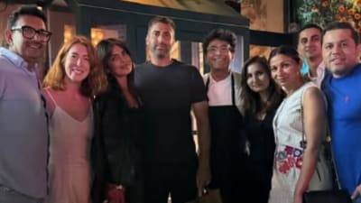 Priyanka Chopra and her friends with chef Vikas Khanna in New York. Priyanka Chopra and her friends with chef Vikas Khanna in New York.