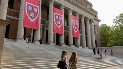 The university said it was experiencing illegal retaliation for rejecting the White House's demands to overhaul Harvard policies related to campus protests, admissions, hiring and more. (Bloomberg)