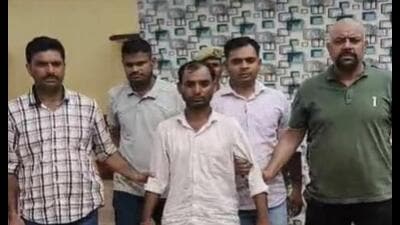 The arrested accused in police custody. (HT Photo)