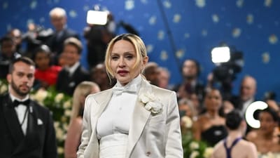 Madonna's recent Instagram post celebrates her fashion influence, featuring her stylish attire and a nod to the Berlin brand Saint Sass.(Photo by Angela WEISS / AFP) (AFP) Madonna's recent Instagram post celebrates her fashion influence, featuring her stylish attire and a nod to the Berlin brand Saint Sass.(Photo by Angela WEISS / AFP) (AFP)