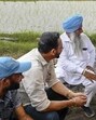 Punjab chief minister Bhagwant Mann interacts with farmers during on Saturday. (PTI)