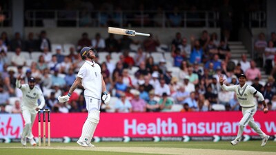 Ben Stokes reacts by tossing his bat after losing his wicket to Mohammed Siraj, with the fielders behind the bat reacting in elation. A quiet day with the willow in hand for the English captain. (Action Images via Reuters)