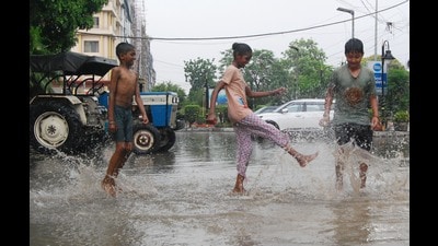 Children play in the rain in Amritsar on Sunday. The southwest monsoon advanced in parts of Punjab on Sunday, while conditions are favourable for its further advancement in parts of Haryana and Chandigarh over the next two days, a senior Met department official said. (Sameer Sehgal/HT) Children play in the rain in Amritsar on Sunday. The southwest monsoon advanced in parts of Punjab on Sunday, while conditions are favourable for its further advancement in parts of Haryana and Chandigarh over the next two days, a senior Met department official said. (Sameer Sehgal/HT)