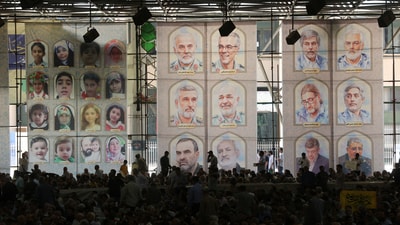 A banner shows pictures of top Iranian officials and military heads who were killed in Israeli strikes (REUTERS)