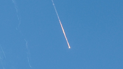 Missiles launched from Iran towards Israel are seen from Tubas, in the Israeli-occupied West Bank, June 22, 2025. REUTERS/Raneen Sawafta (REUTERS)