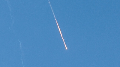 Missiles launched from Iran towards Israel are seen from Tubas, in the Israeli-occupied West Bank, June 22, 2025.&nbsp; (REUTERS)