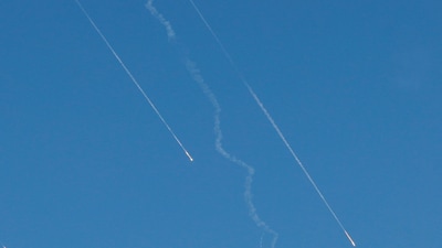 Missiles launched from Iran towards Israel are seen from Tubas, in the Israeli-occupied West Bank, June 22, 2025. (Reuters)