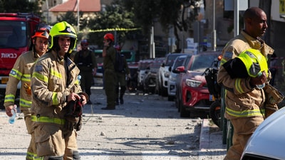 First responders gather at an impact site following Iran's strike on Israel, amid the Iran-Israel conflict, in Haifa, Israel, June 22, 2025. (REUTERS)