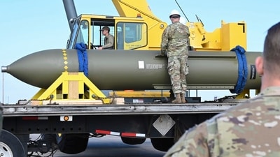 FILE - In this photo released by the U.S. Air Force on May 2, 2023, airmen look at a GBU-57, or the Massive Ordnance Penetrator bomb, at Whiteman Air Base in Missouri. (File Photo/AP) FILE - In this photo released by the U.S. Air Force on May 2, 2023, airmen look at a GBU-57, or the Massive Ordnance Penetrator bomb, at Whiteman Air Base in Missouri. (File Photo/AP)