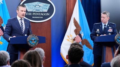 US defense secretary Pete Hegseth and joint chiefs chairman Gen. Dan Caine speak during a news conference at the Pentagon. (AP) US defense secretary Pete Hegseth and joint chiefs chairman Gen. Dan Caine speak during a news conference at the Pentagon. (AP)