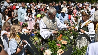 The mid pole is decorated during Midsummer celebrations on the island of Gotland, Sweden, on June 20, 2025. (AFP) The mid pole is decorated during Midsummer celebrations on the island of Gotland, Sweden, on June 20, 2025. (AFP)