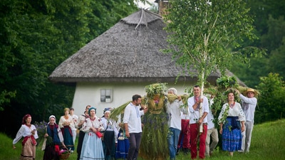 People perform a rite during a traditional midsummer celebration in Pyrohiv, Ukraine, outside of Kyiv, Saturday, June 21, 2025. (AP Photo/Efrem Lukatsky) (AP) People perform a rite during a traditional midsummer celebration in Pyrohiv, Ukraine, outside of Kyiv, Saturday, June 21, 2025. (AP Photo/Efrem Lukatsky) (AP)