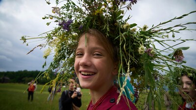 A young woman dressed in traditional Ukrainian clothing smilies during a traditional midsummer celebration in Pyrohiv, Ukraine, outside of Kyiv, Saturday, June 21, 2025. (AP Photo/Efrem Lukatsky) (AP) A young woman dressed in traditional Ukrainian clothing smilies during a traditional midsummer celebration in Pyrohiv, Ukraine, outside of Kyiv, Saturday, June 21, 2025. (AP Photo/Efrem Lukatsky) (AP)