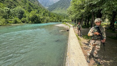 ITBP personnel patrol an area at Betaab Valley of Pahalgam ahead of reopening of tourists places in the area, which were closed in view of security considerations after the April 22 Pahalgam attack, in Anantnag district, Sunday (PTI) ITBP personnel patrol an area at Betaab Valley of Pahalgam ahead of reopening of tourists places in the area, which were closed in view of security considerations after the April 22 Pahalgam attack, in Anantnag district, Sunday (PTI)