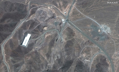 This satellite image provided by Maxar Technologies shows vehicles at Fordo enrichment facility in Iran on Thursday, June 19, 2025. (AP) This satellite image provided by Maxar Technologies shows vehicles at Fordo enrichment facility in Iran on Thursday, June 19, 2025. (AP)