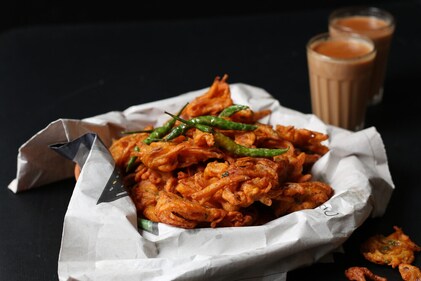 Chai with pakoras (fritters) may feel good, but the combination is not good for health. (Shutterstock) Chai with pakoras (fritters) may feel good, but the combination is not good for health. (Shutterstock)