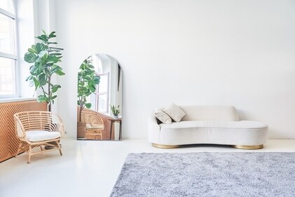 The strategic placement of a mirror helps brighten up the room. (Shutterstock)