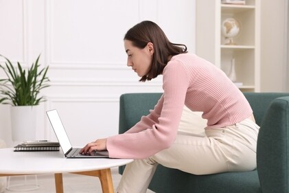 Poor back posture can be caused by foot pain also. (Shutterstock)