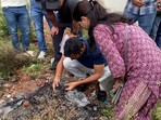 Meghalaya SIT team and FSL Indore, collect the pieces of the burnt bag and burnt pieces of Sonam Raghuvanshi's belongings for forensic investigation, at Hare Krishna Vihar Colony in Indore. Meghalaya SIT team and FSL Indore, collect the pieces of the burnt bag and burnt pieces of Sonam Raghuvanshi's belongings for forensic investigation, at Hare Krishna Vihar Colony in Indore.